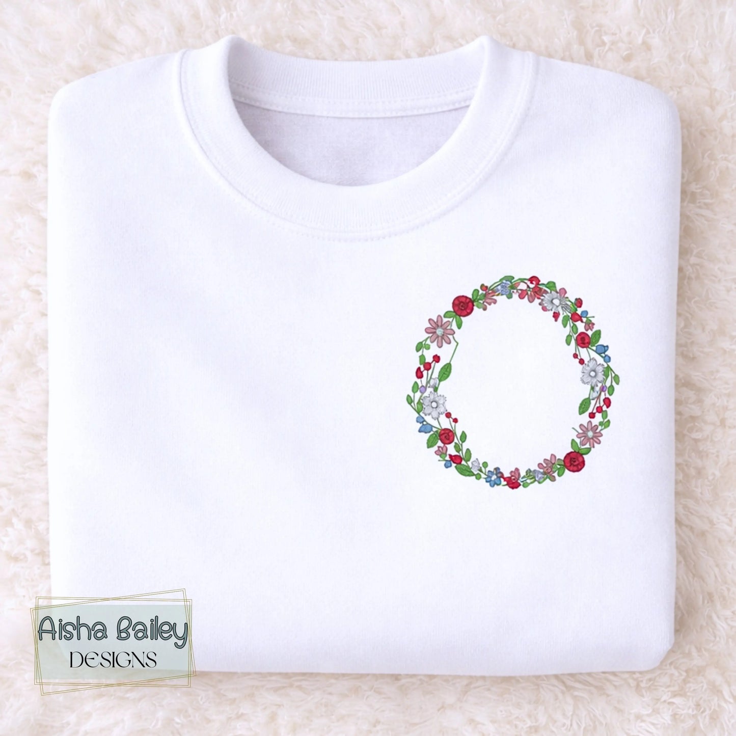 Floral initial embroidered sweatshirt: Floral initial girls sweatshirt featuring delicate embroidered flower letter design on soft kids jumper.
