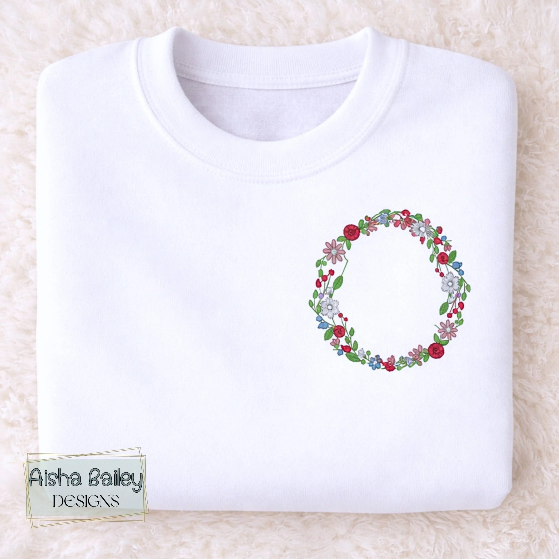 Floral initial embroidered sweatshirt: Floral initial girls sweatshirt featuring delicate embroidered flower letter design on soft kids jumper.
