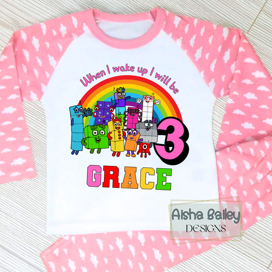 Numberblocks birthday pyjamas for girls personalised with name and age
Personalised girls birthday eve pyjamas featuring Numberblocks characters
Milestone birthday pyjama set with custom name and age