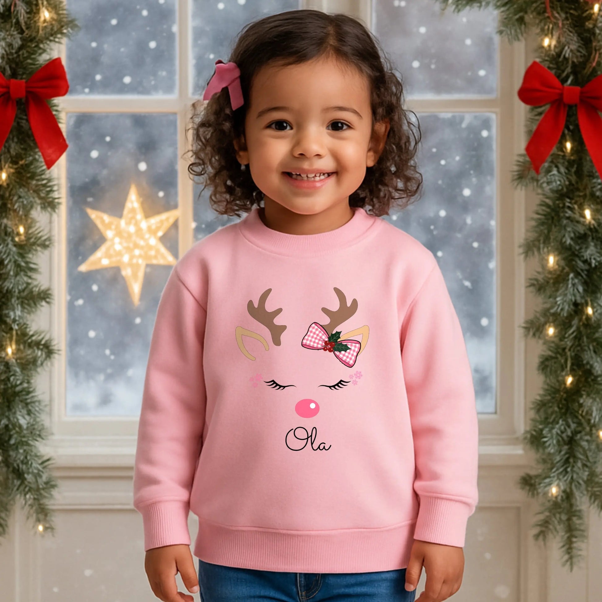Girls Christmas Sweatshirt: Personalised Christmas sweatshirt for girls with pink reindeer design and custom name print.
