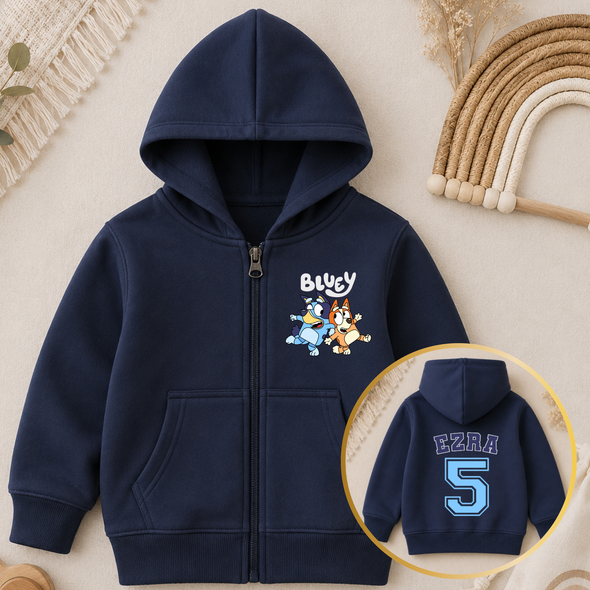 Personalised Boys Birthday Hoodie featuring Bluey and Bingo on the front, with your child's name and birthday age in a fun varsity-style design on the back.