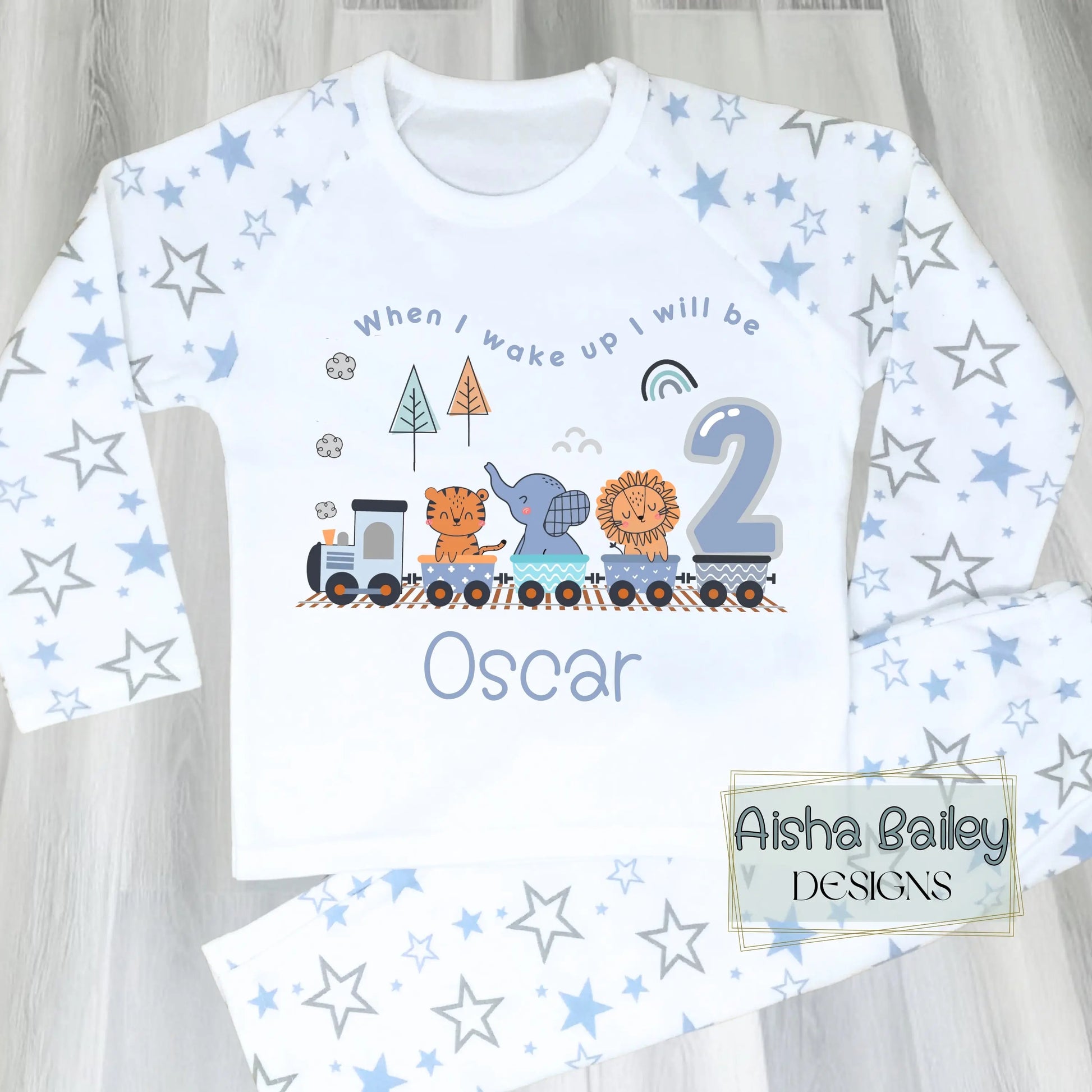 Personalised Safari birthday pyjamas with animal train design, custom name and age for boys