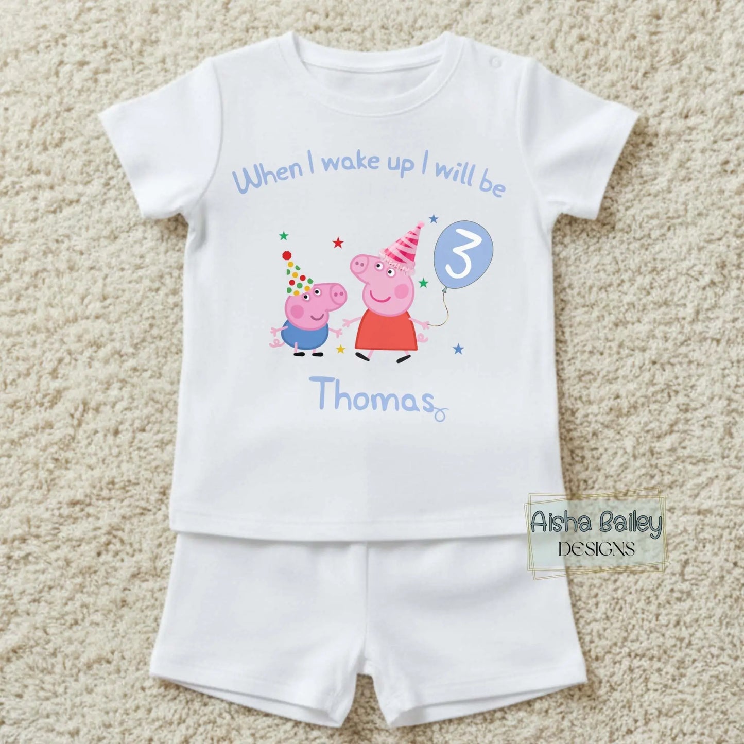 Personalised Peppa and George Pig Birthday Pyjamas for Boys with custom name and age, featuring birthday number  on white short set