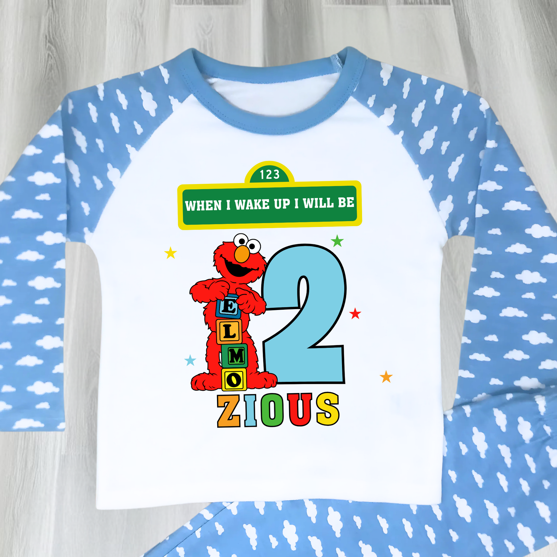 Elmo birthday pyjamas for boys with custom name and age, featuring Elmo from Sesame Street with bright birthday number, name printed underneath, soft and comfy pyjama set perfect for birthday morning celebrations