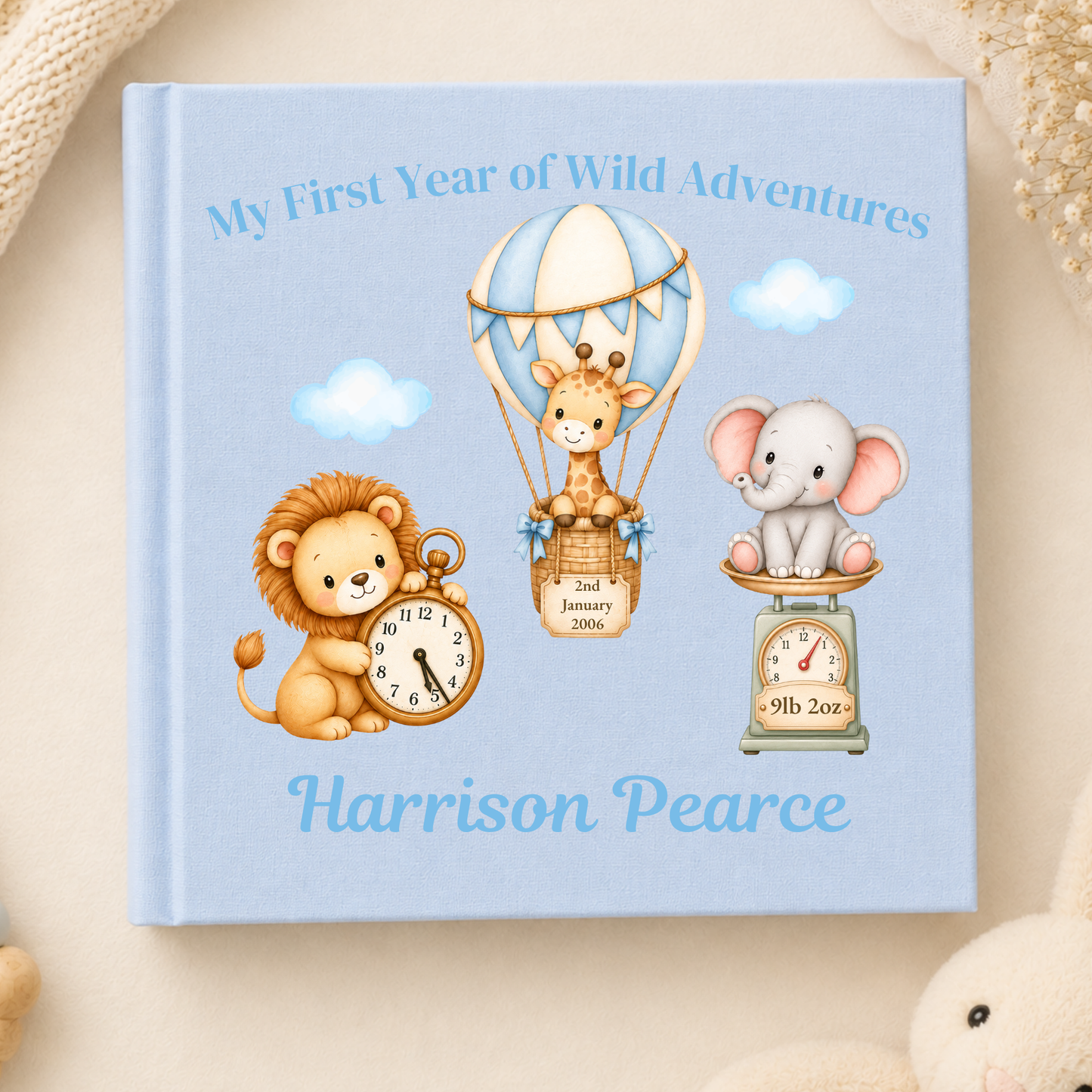 Personalised Baby Photo Album with blue safari animals, baby's name, birth date, time and weight, designed to capture his first year.