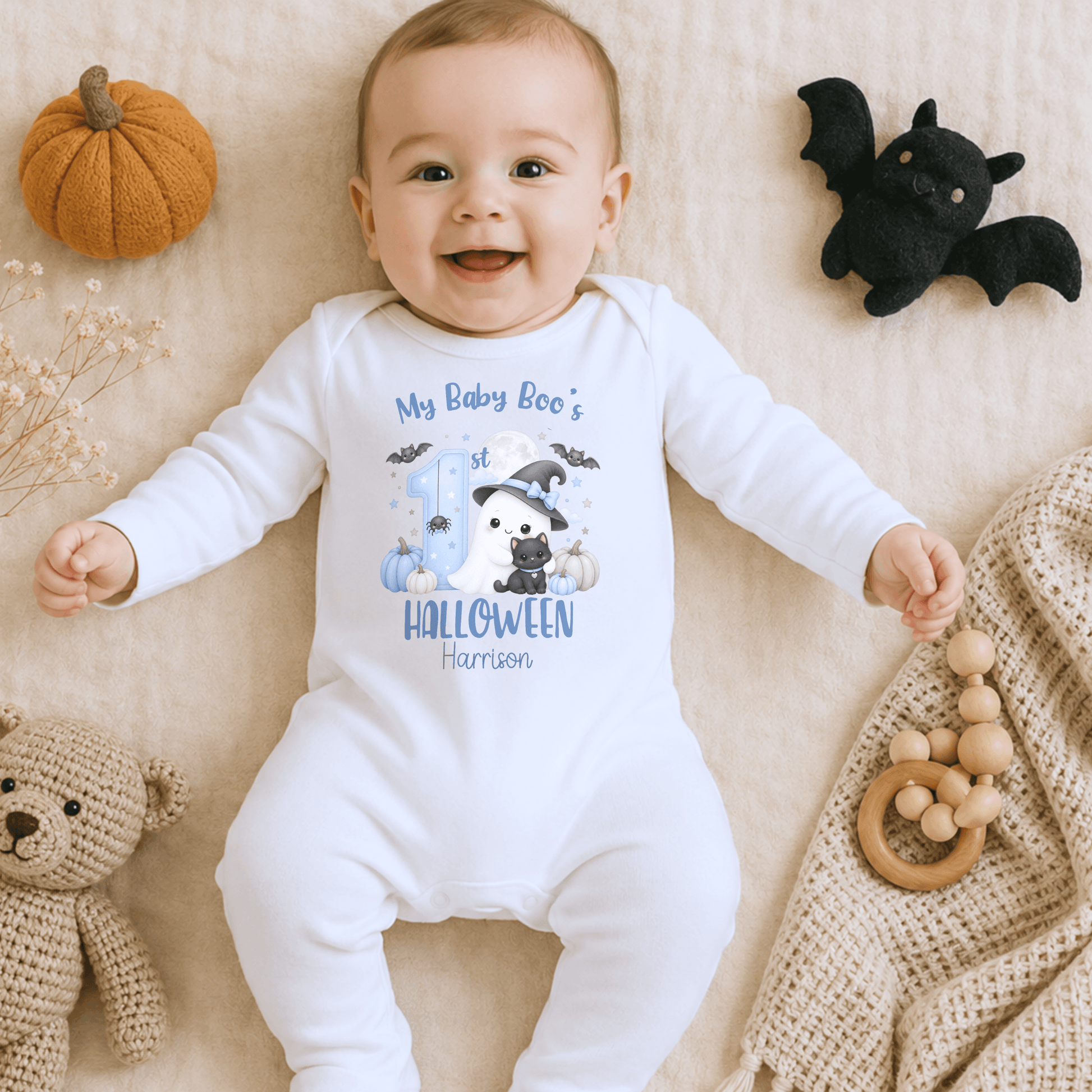 Personalised First Halloween Baby Outfit for boys featuring a cute Baby Boo ghost, black cat, pumpkins, bats and personalised 1st Halloween design.