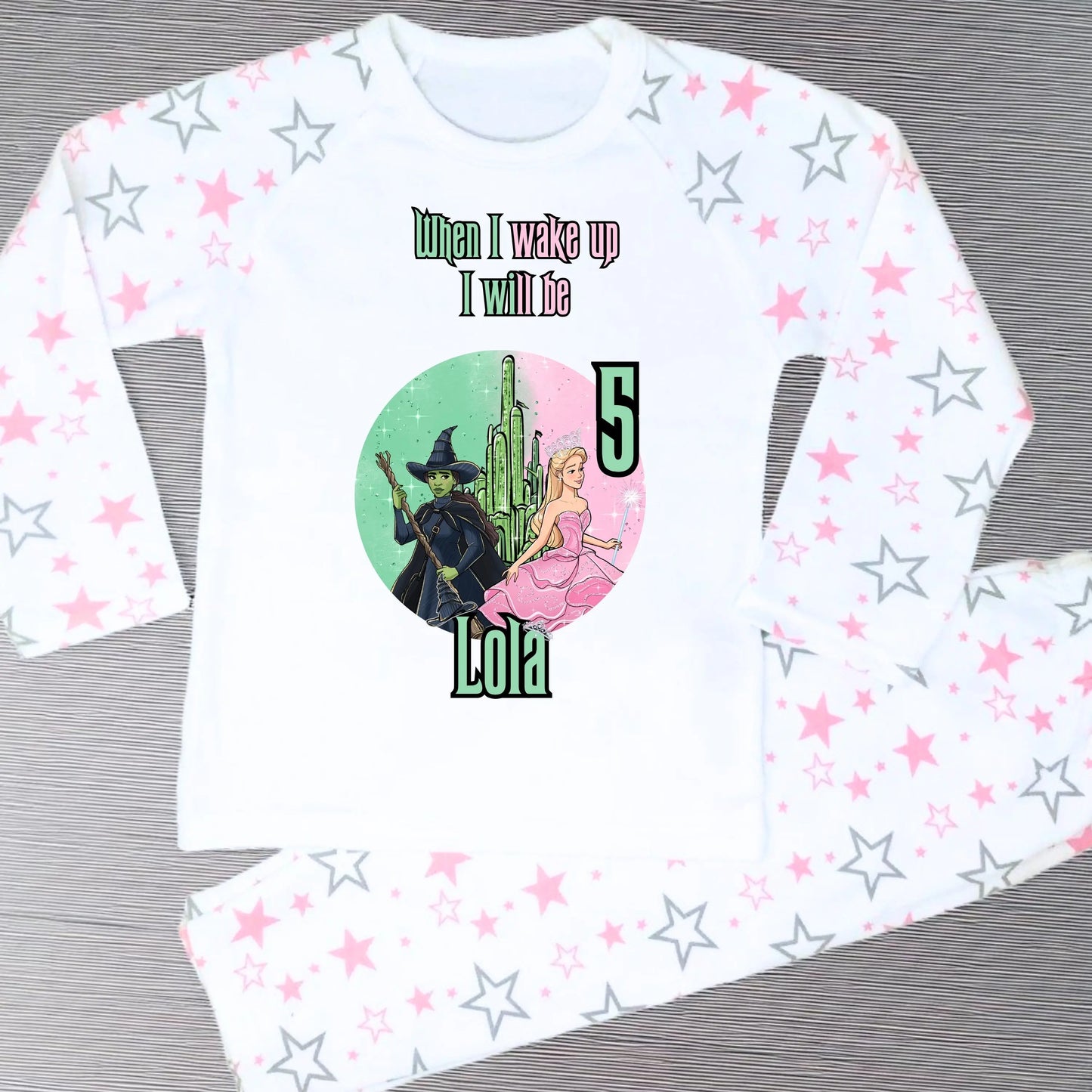 Pink Wicked Birthday Pyjamas for Girls with custom name and age featuring magical character design.