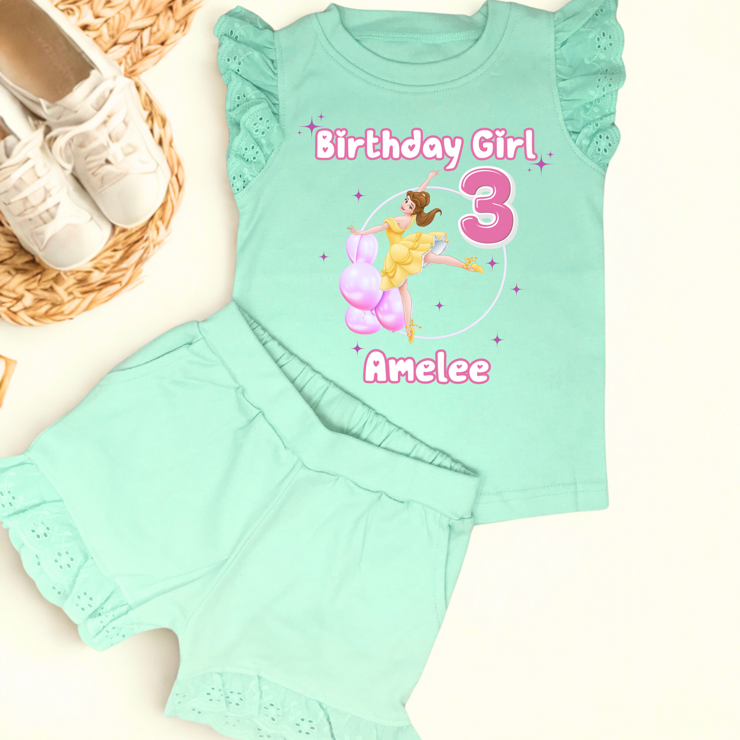 Personalised Girls Princess Ballerina Birthday Outfit, Ballerina Birthday Frilly Shorts & Top in Pink. At the top it says Birthday Girl, followed by a princess ballerina in a balloon arch and the child's name underneath.