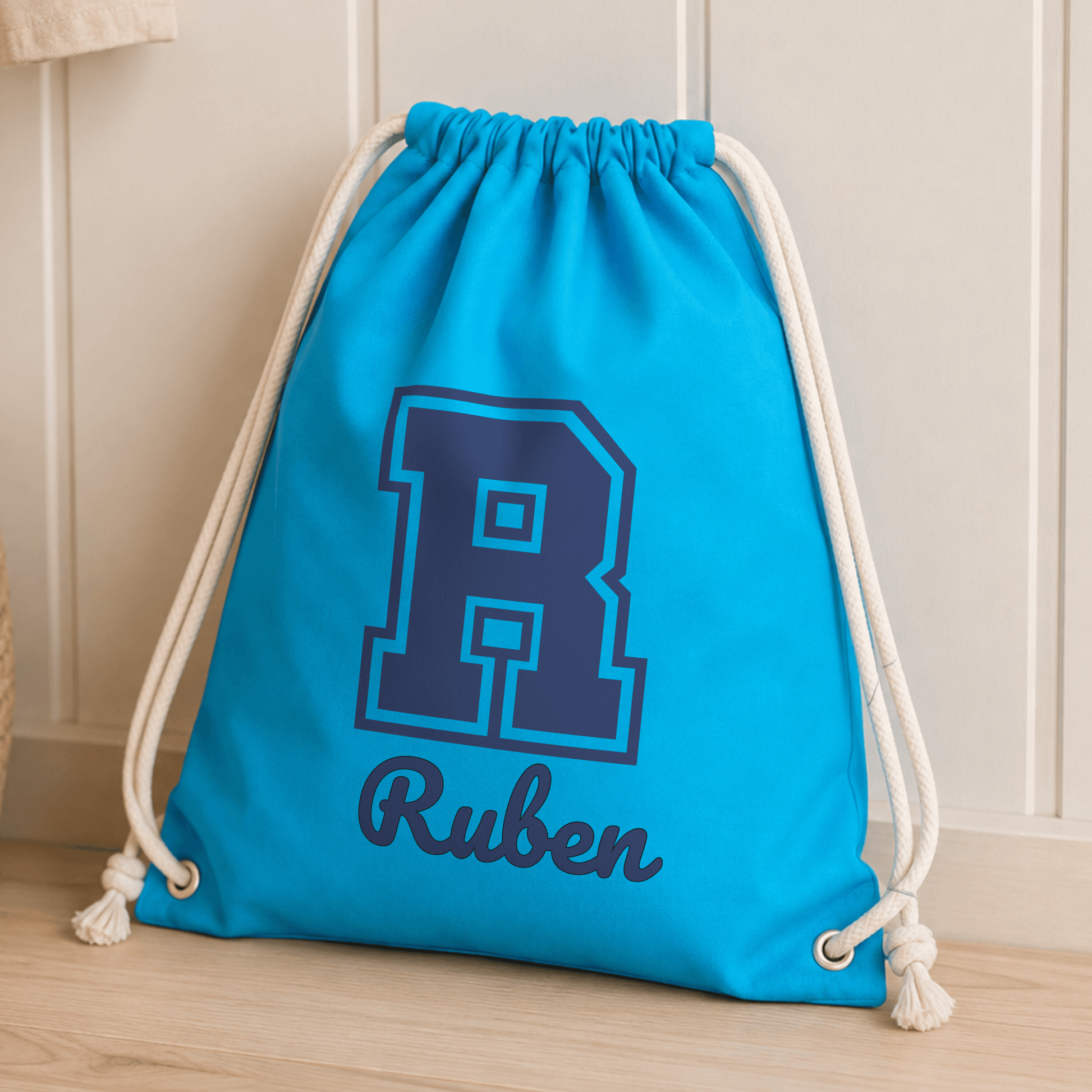 Personalised Varsity PE Drawstring Bag for Boys with custom initial and name, ideal for school, sports, swimming and gym kits.