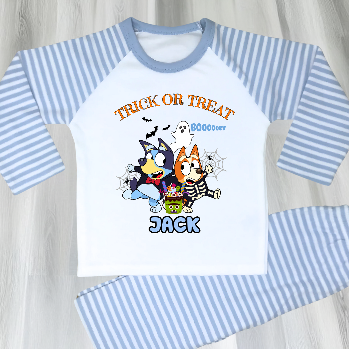 Boys personalised Bluey and Bingo Halloween pyjamas with name print and cute spooky design