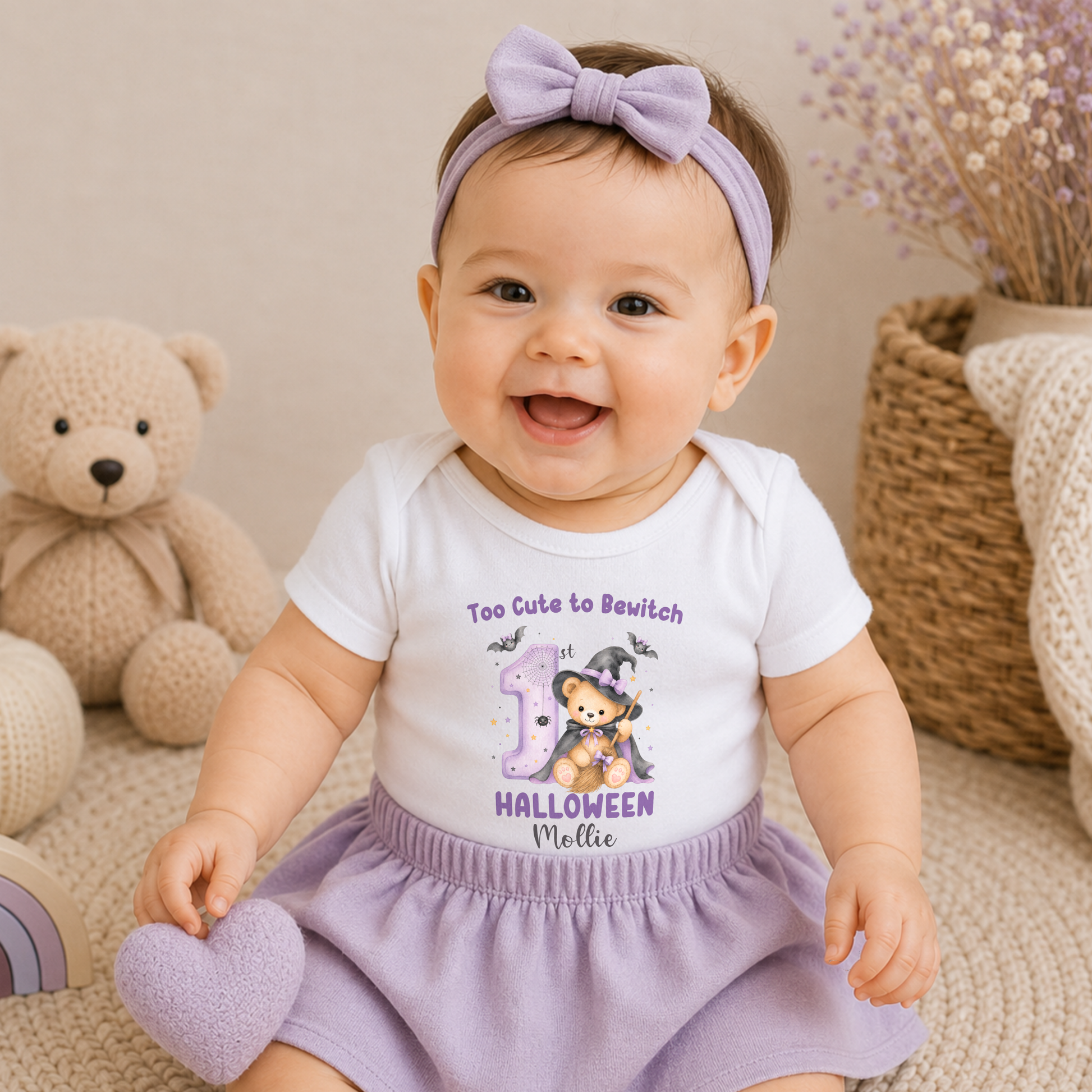 Personalised First Halloween Baby Outfit: Baby’s First Halloween personalised baby girl bodysuit with name, teddy bear witch, bats and first Halloween design.