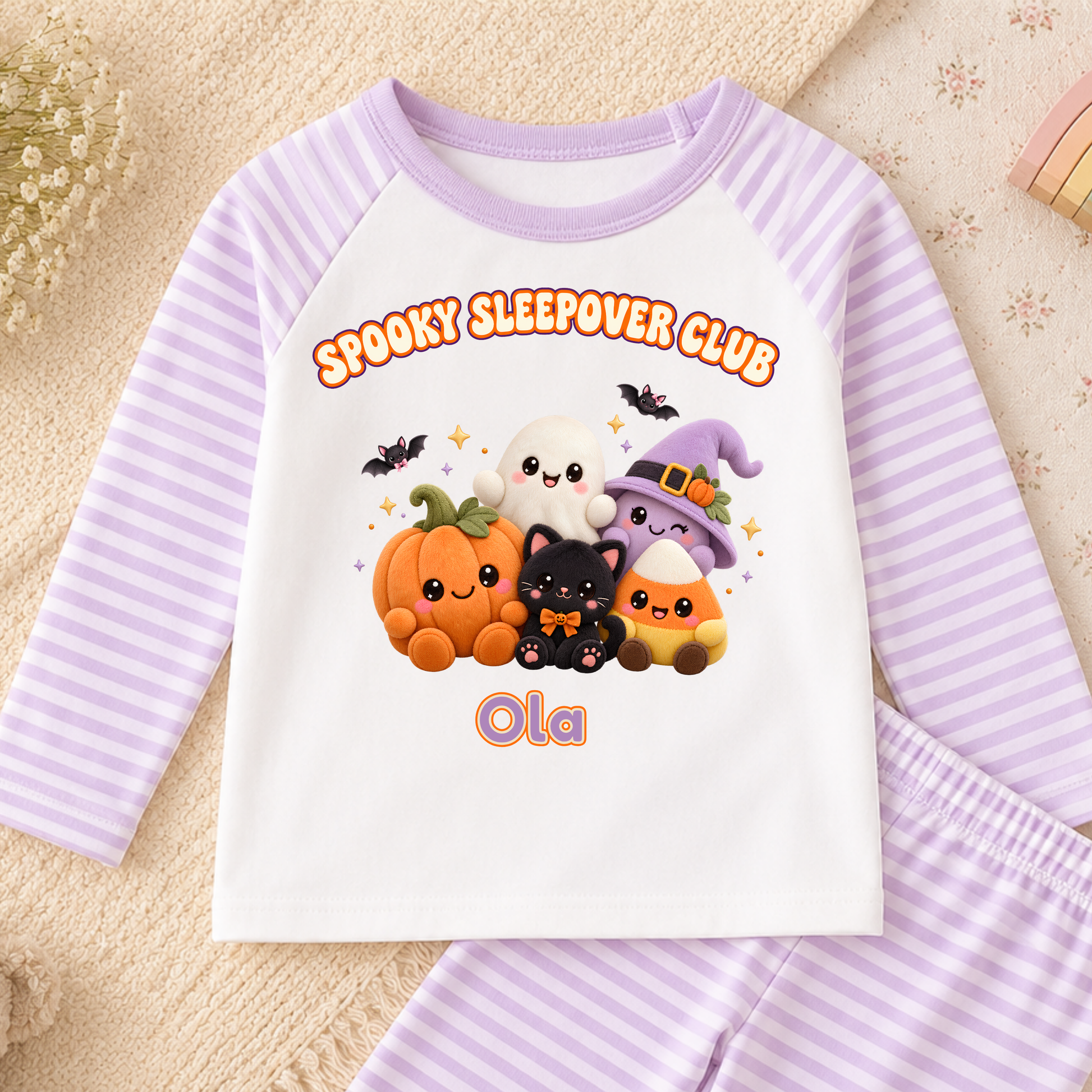 Personalised Halloween Pyjamas for Kids with kawaii plush pumpkin, ghost, witch, black cat and candy corn Spooky Sleepover Club design.