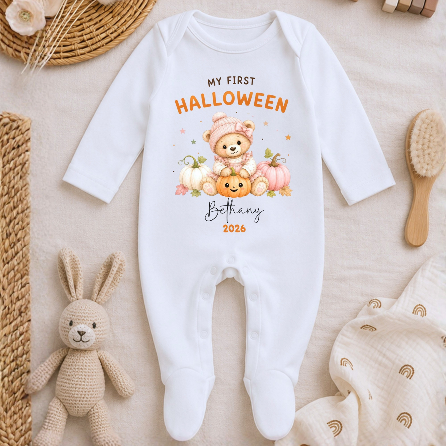 Personalised First Halloween Baby Outfit with cute teddy bear and pumpkins, customised with baby's name and year for their first Halloween.