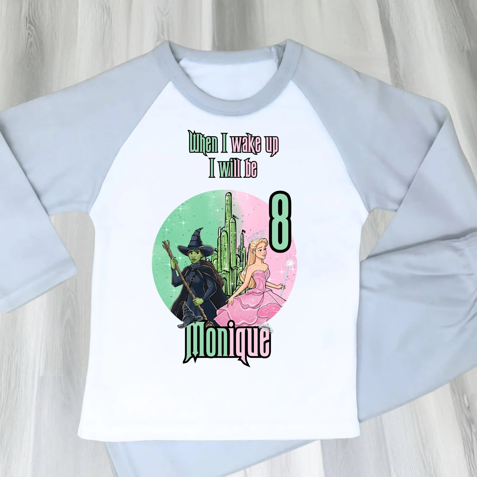 Pink Wicked Birthday Pyjamas for Girls with custom name and age featuring magical character design.