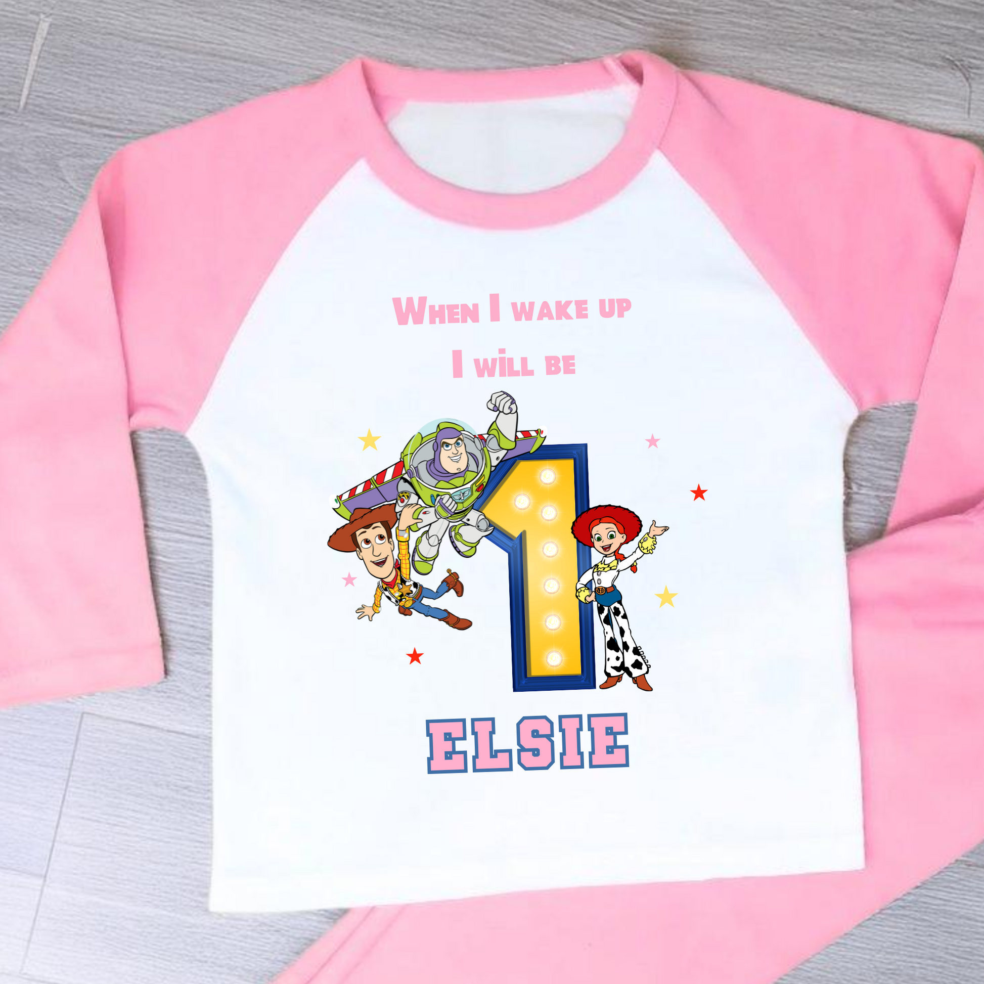 Toy Story birthday pyjamas for girls with custom name and age, featuring Buzz Lightyear, Woody, and Jessie, bold birthday number in Toy Story colours, and name printed underneath, soft and comfy sleepwear set for birthday mornings