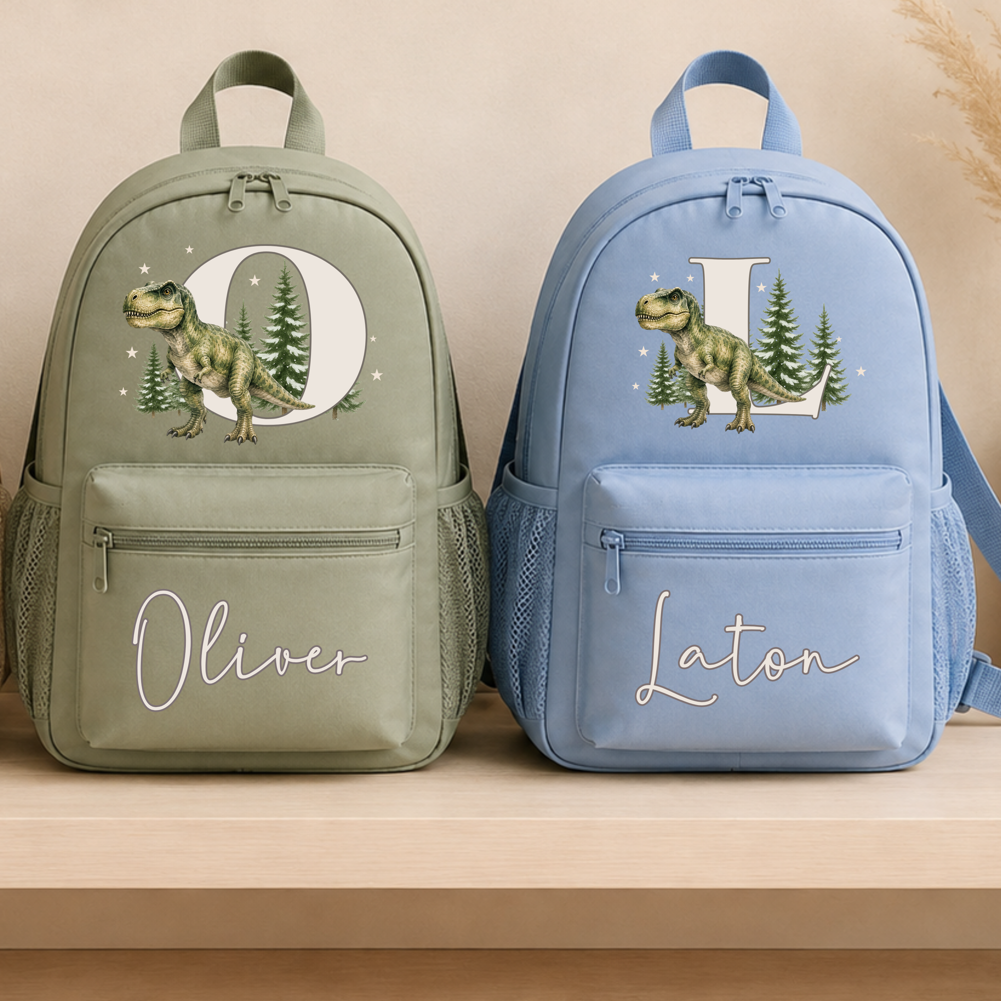 Personalised dinosaur backpack for boys with realistic watercolour T-Rex, woodland initial and custom name on sage, beige and blue school rucksack.