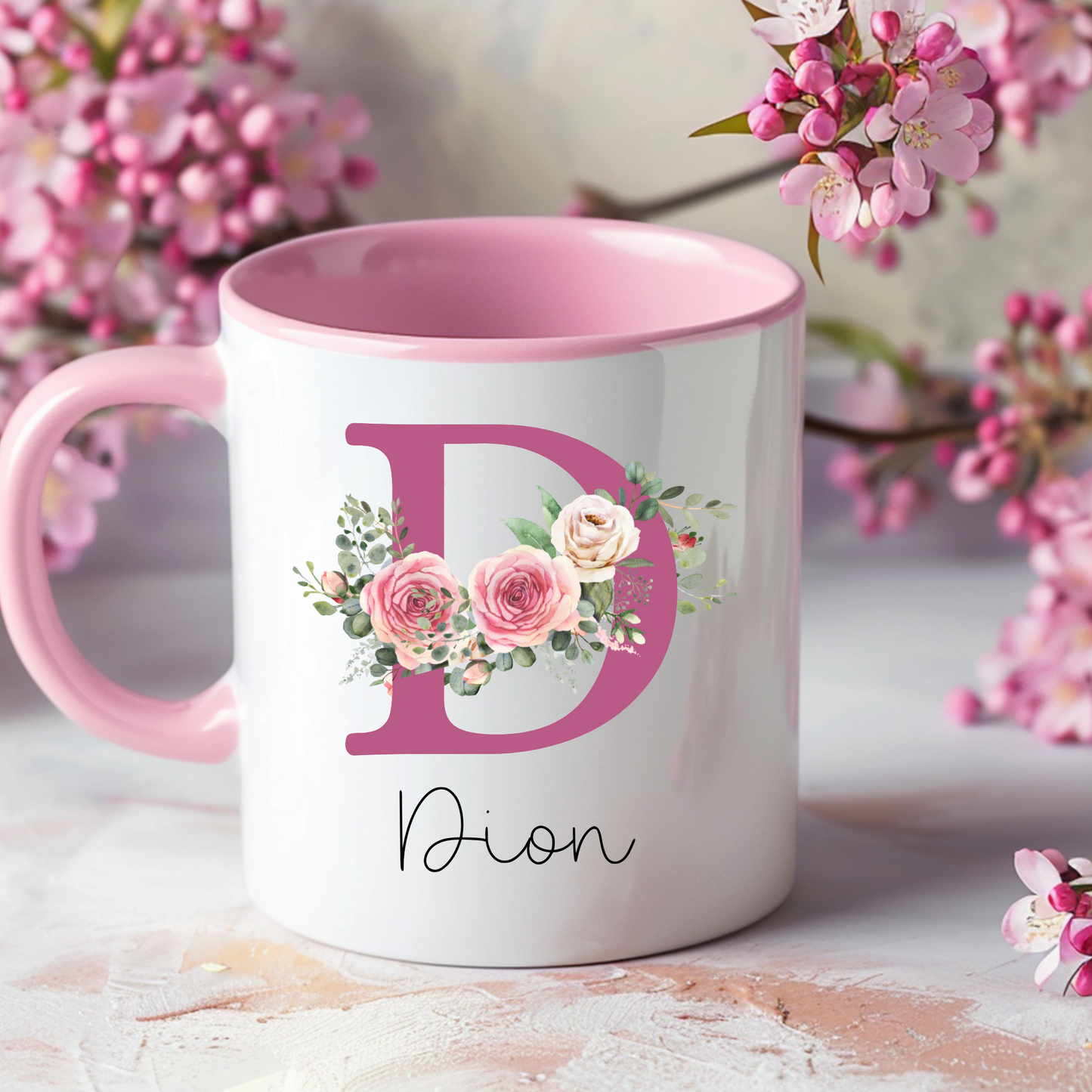 Personalised Wedding Party Mug: A personalised floral initial mug featuring a beautifully designed letter adorned with colourful flowers, accompanied by a custom name. This elegant coffee cup serves as a thoughtful gift for bridesmaids, flower girls, or a cherished keepsake for a mother. Ideal for wedding parties, this unique mug adds a personal touch to any occasion. Wedding party gift, thank you flower girl, bridesmaid, Floral design coffee mug