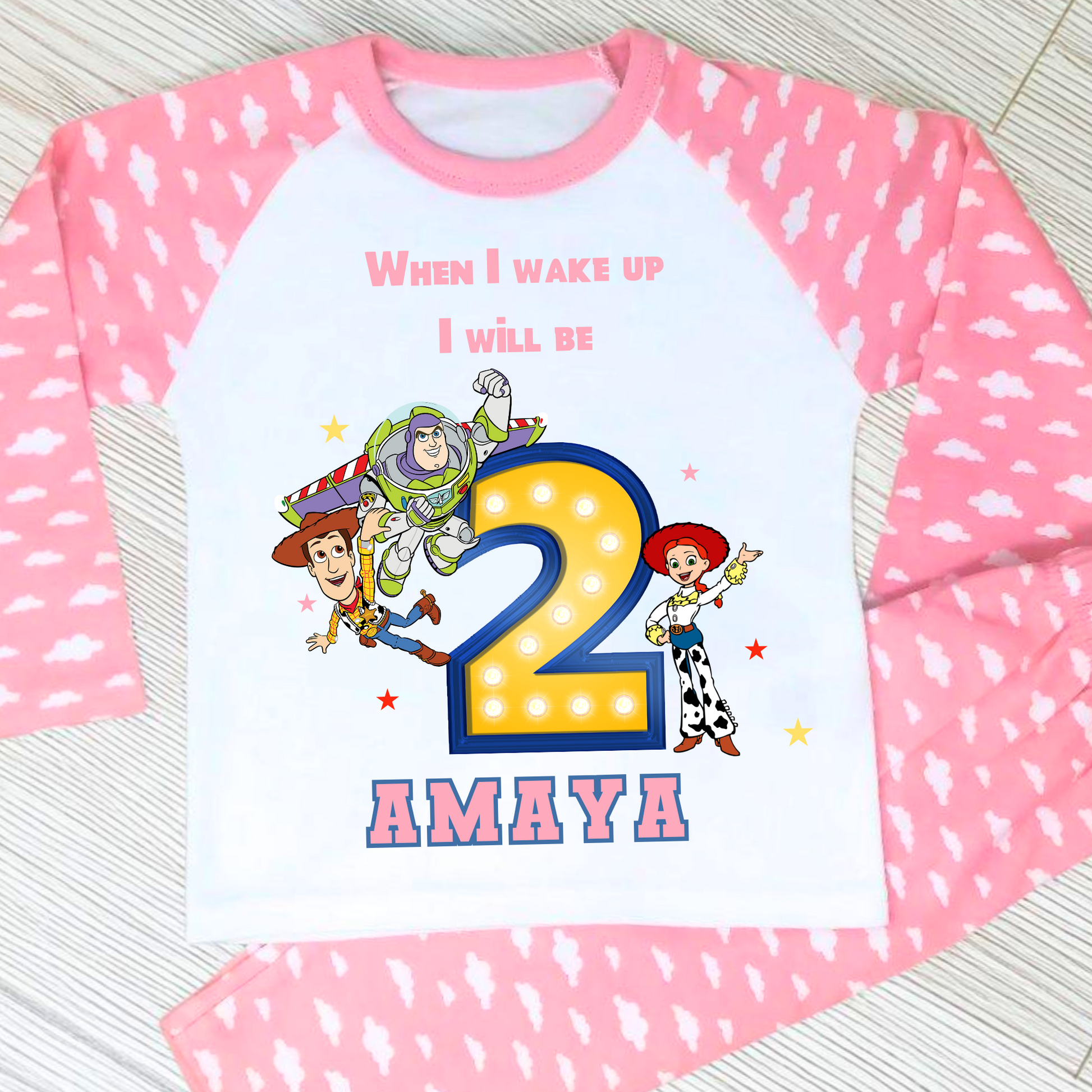 Toy Story birthday pyjamas for girls with custom name and age, featuring Buzz Lightyear, Woody, and Jessie, bold birthday number in Toy Story colours, and name printed underneath, soft and comfy sleepwear set for birthday mornings