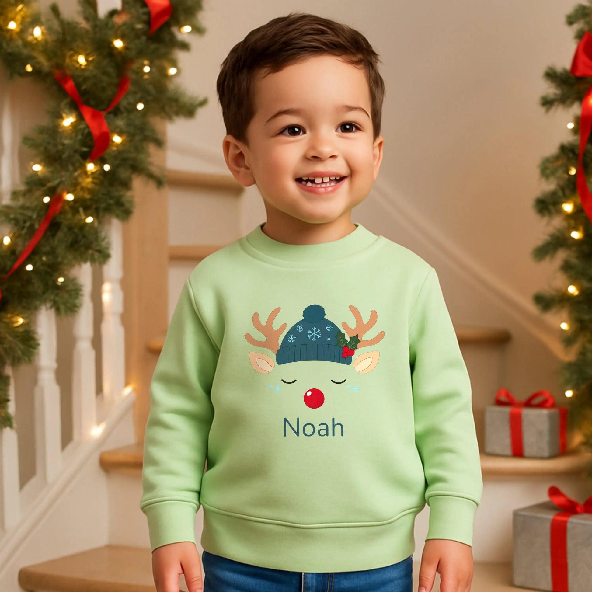 Boys Christmas Sweatshirt: Personalised boys Christmas sweatshirt with reindeer design and custom name print.