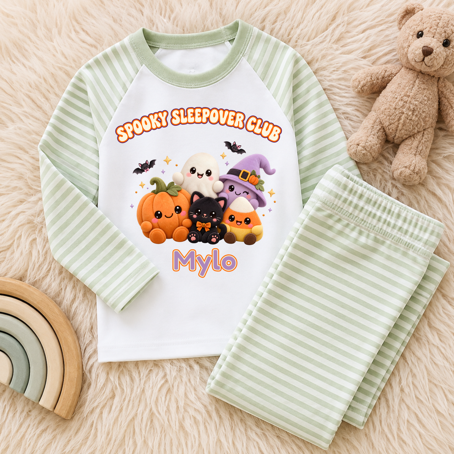 Personalised Halloween Pyjamas for Kids with kawaii plush pumpkin, ghost, witch, black cat and candy corn Spooky Sleepover Club design.