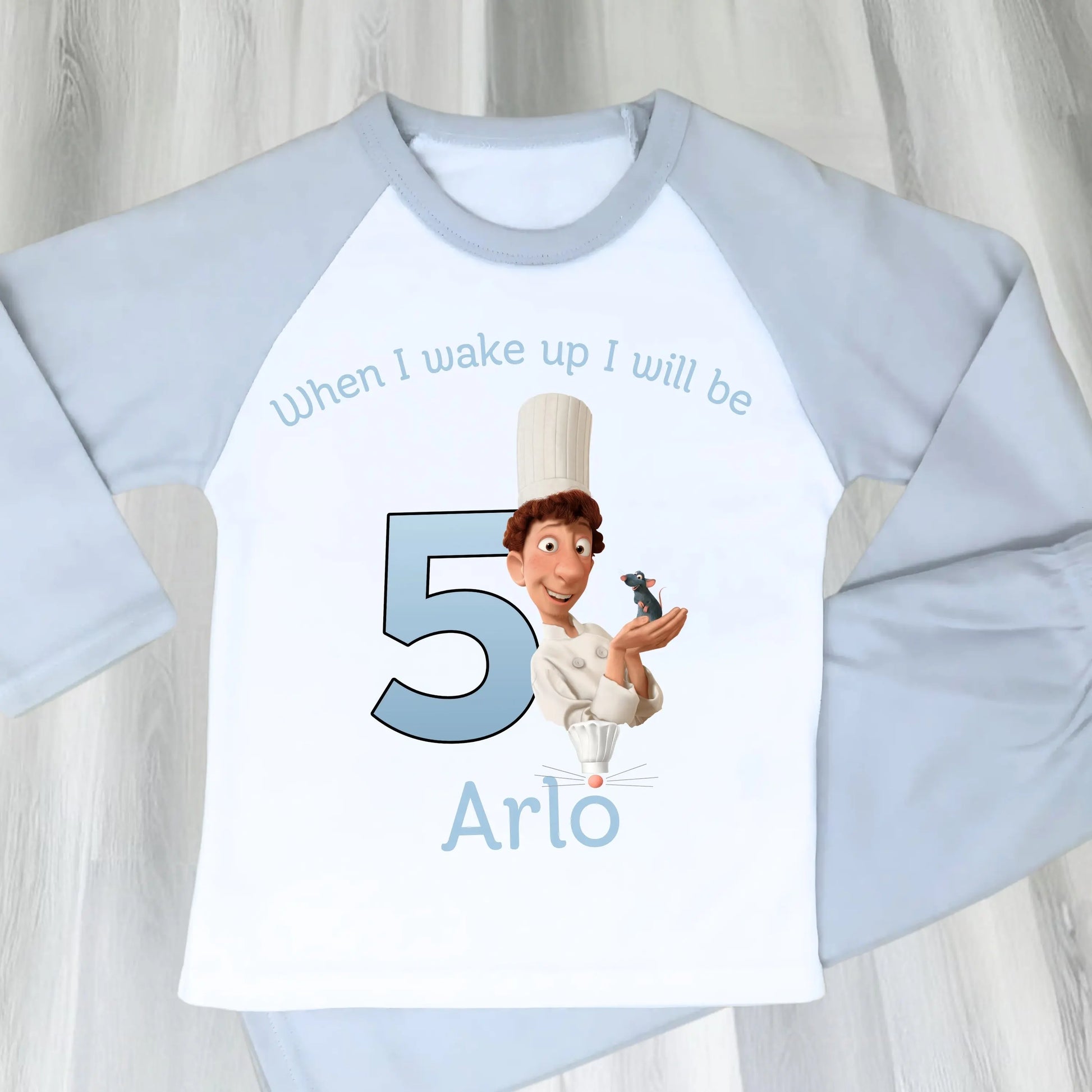 Ratatouille birthday pyjamas: Blue and white personalised birthday pyjamas with ratatouille character with name and age for boys