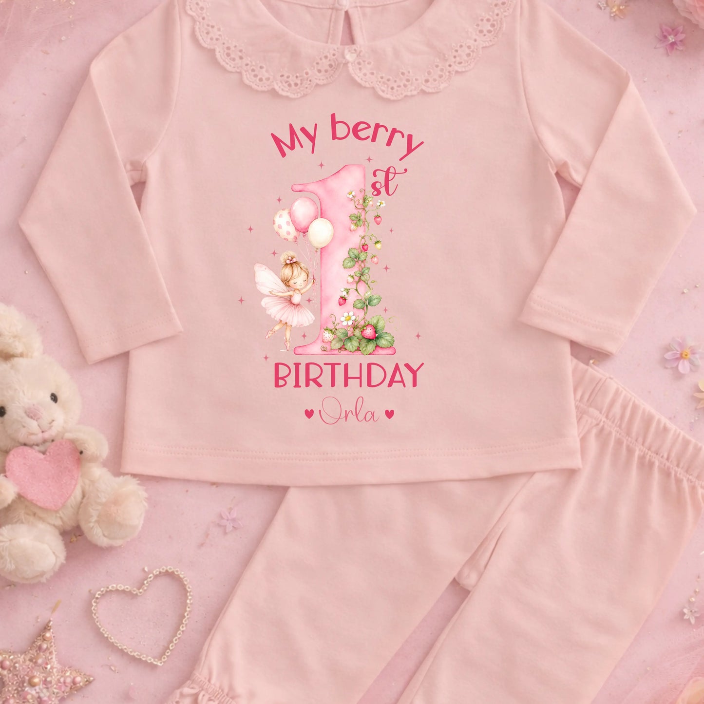 Personalised girls berry first birthday pyjamas with strawberry fairy number one design, custom name birthday outfit, frill collar toddler birthday set.
