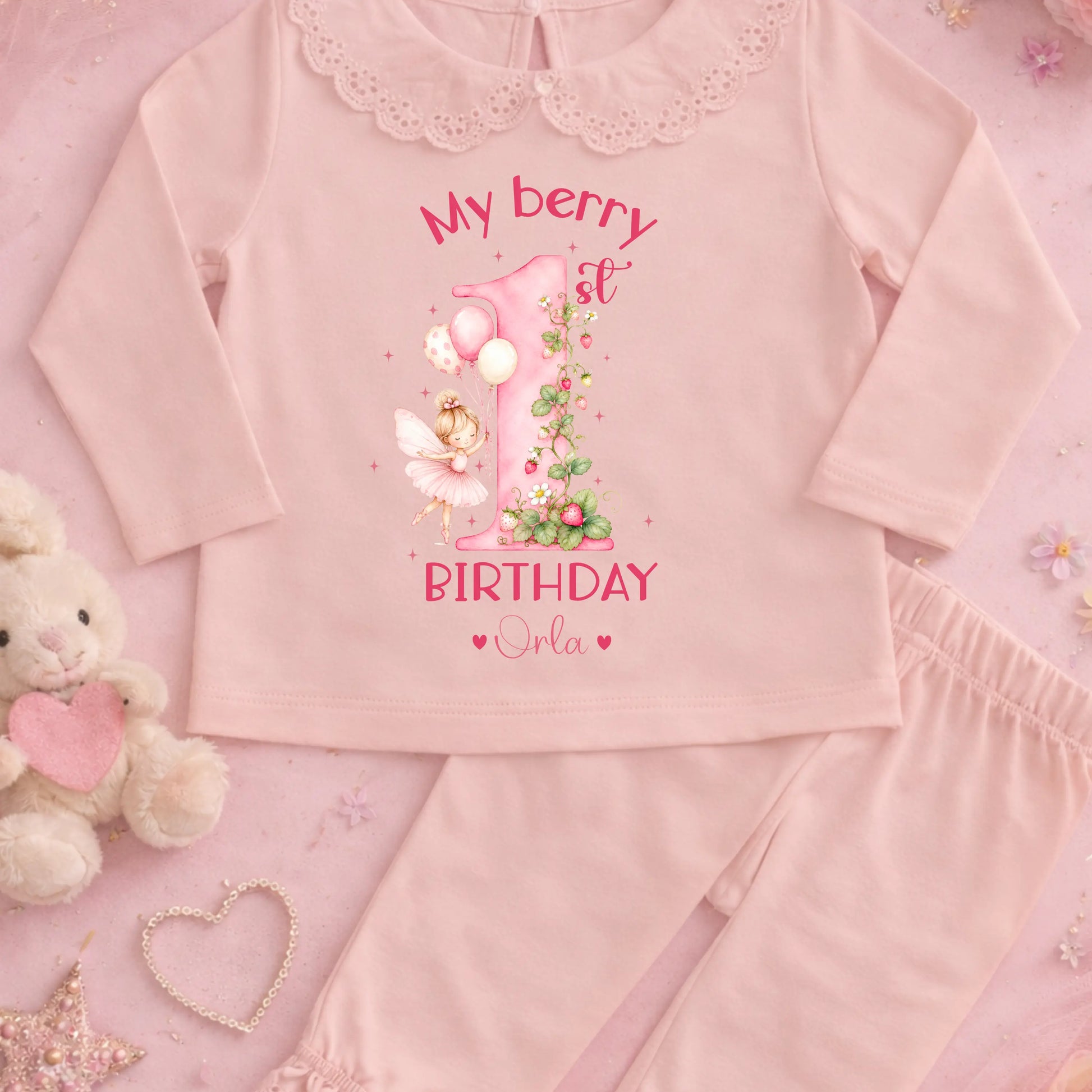 Personalised girls berry first birthday pyjamas with strawberry fairy number one design, custom name birthday outfit, frill collar toddler birthday set.