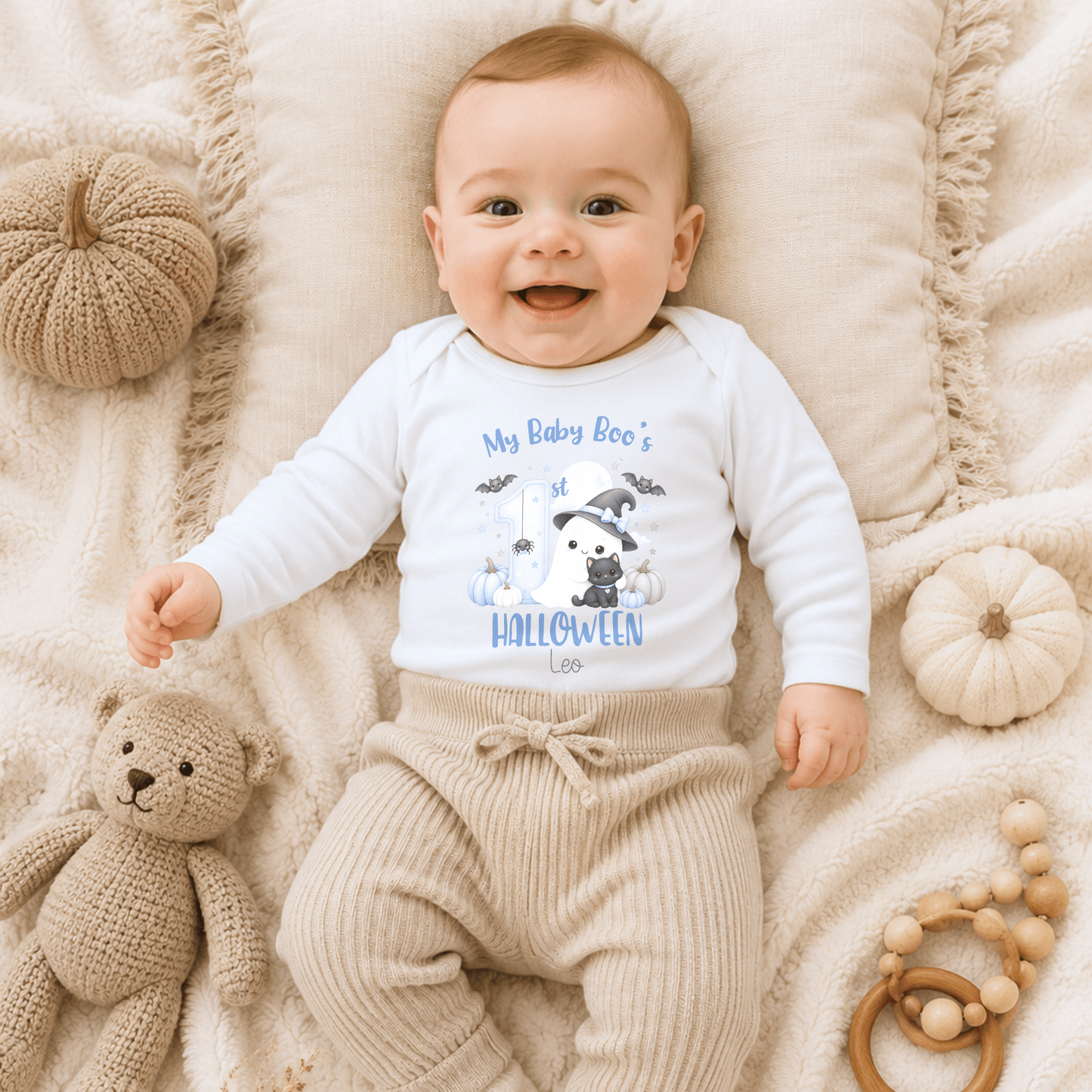Personalised First Halloween Baby Outfit for boys featuring a cute Baby Boo ghost, black cat, pumpkins, bats and personalised 1st Halloween design.