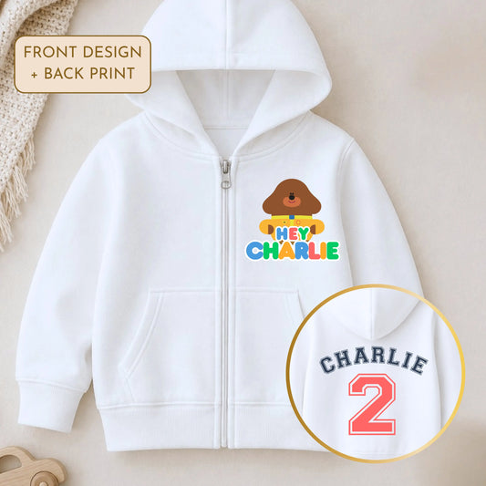 Personalised Hey Duggee birthday hoodie for boys with custom name and number back print on white zip-up childrens hoodie - aishabaileydesigns