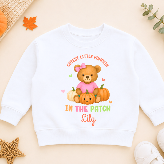 Girls Personalised Halloween Sweatshirt with cute teddy bear, pumpkins, Cutest Pumpkin in the Patch design and child's personalised name.