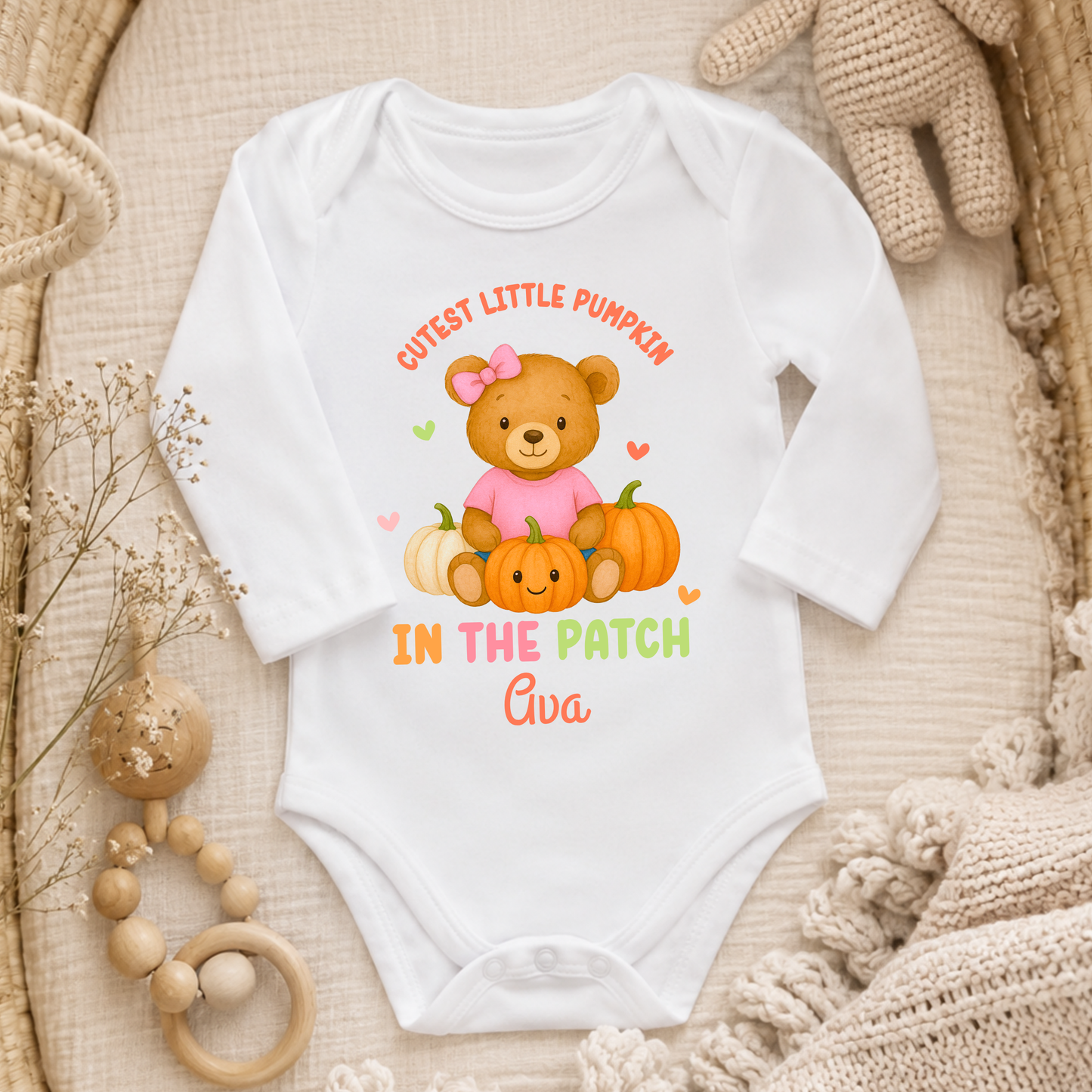 Baby’s First Halloween personalised pumpkin outfit for baby girl with teddy bear, pumpkins and Cutest Pumpkin in the Patch design.