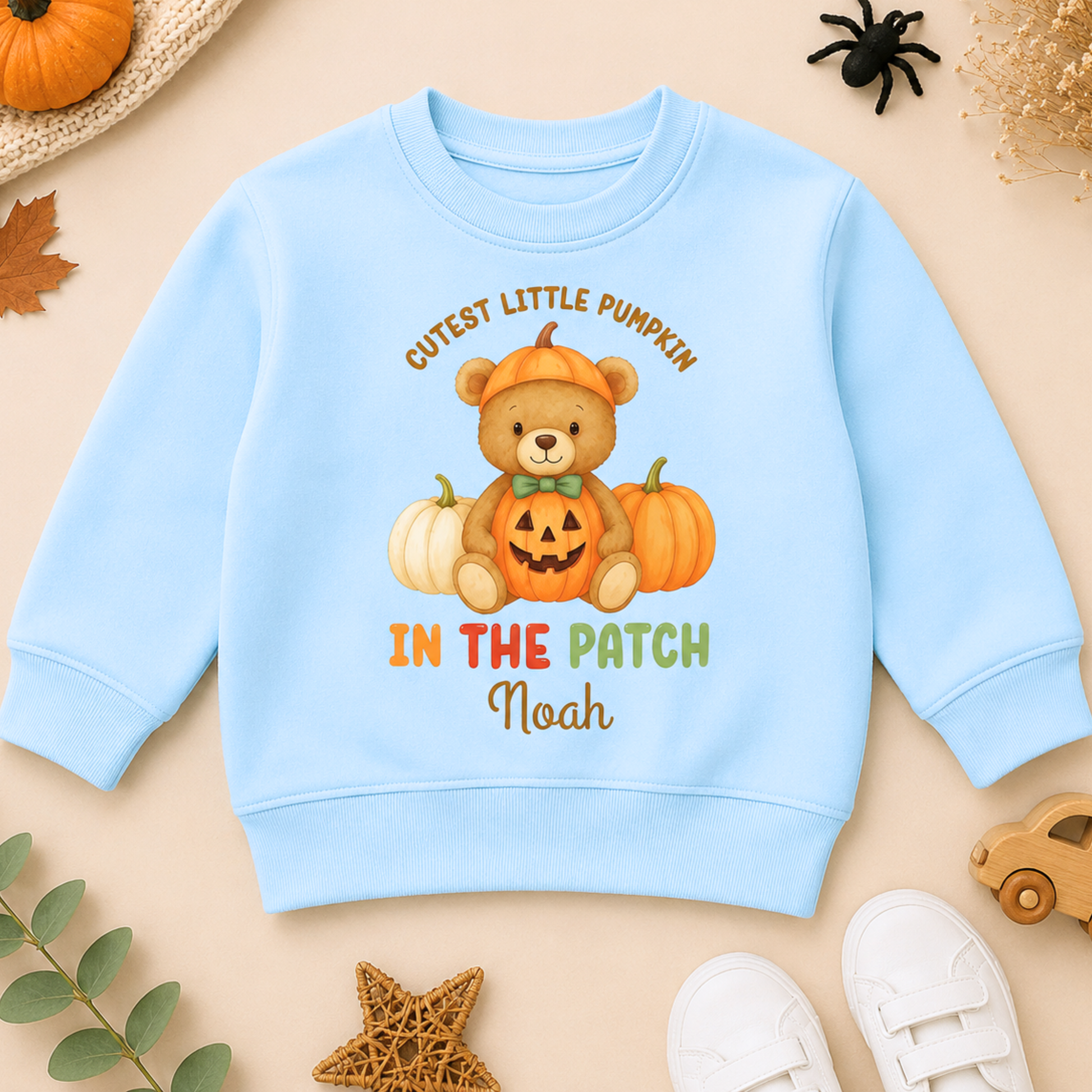 Boys Personalised Halloween Sweatshirt with cute teddy bear, pumpkins, Cutest Pumpkin in the Patch design and child's personalised name.