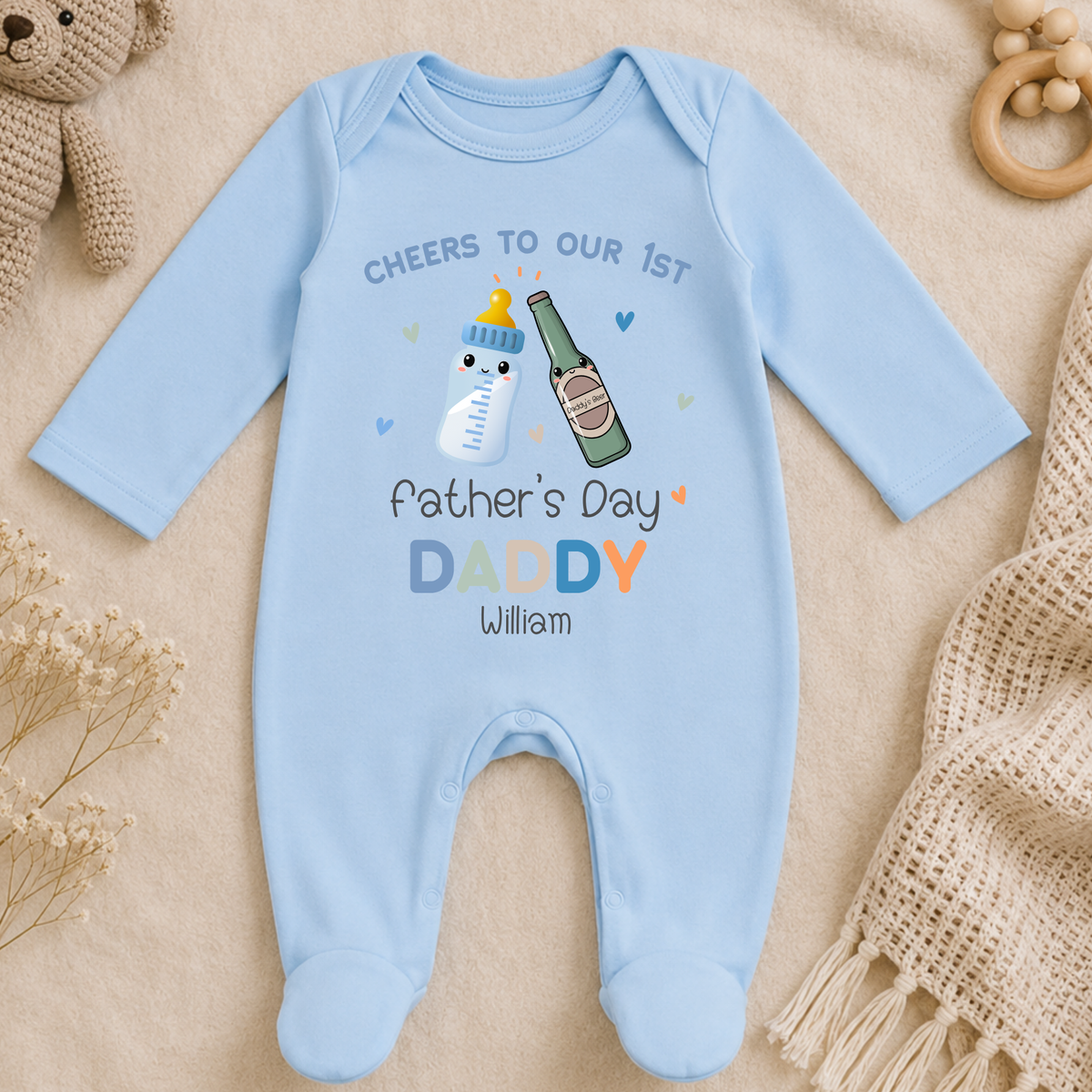 1st Father’s Day Outfit featuring a cute Daddy and Baby drinks toast design, available as a baby sleepsuit, vest, T-shirt or bib.
