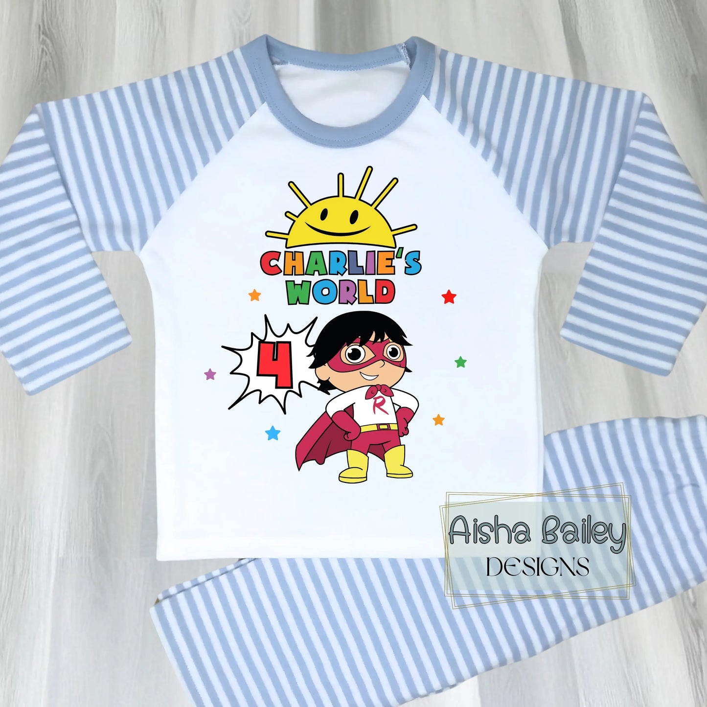 Ryan's World personalised birthday pyjamas for boys with colourful superhero design