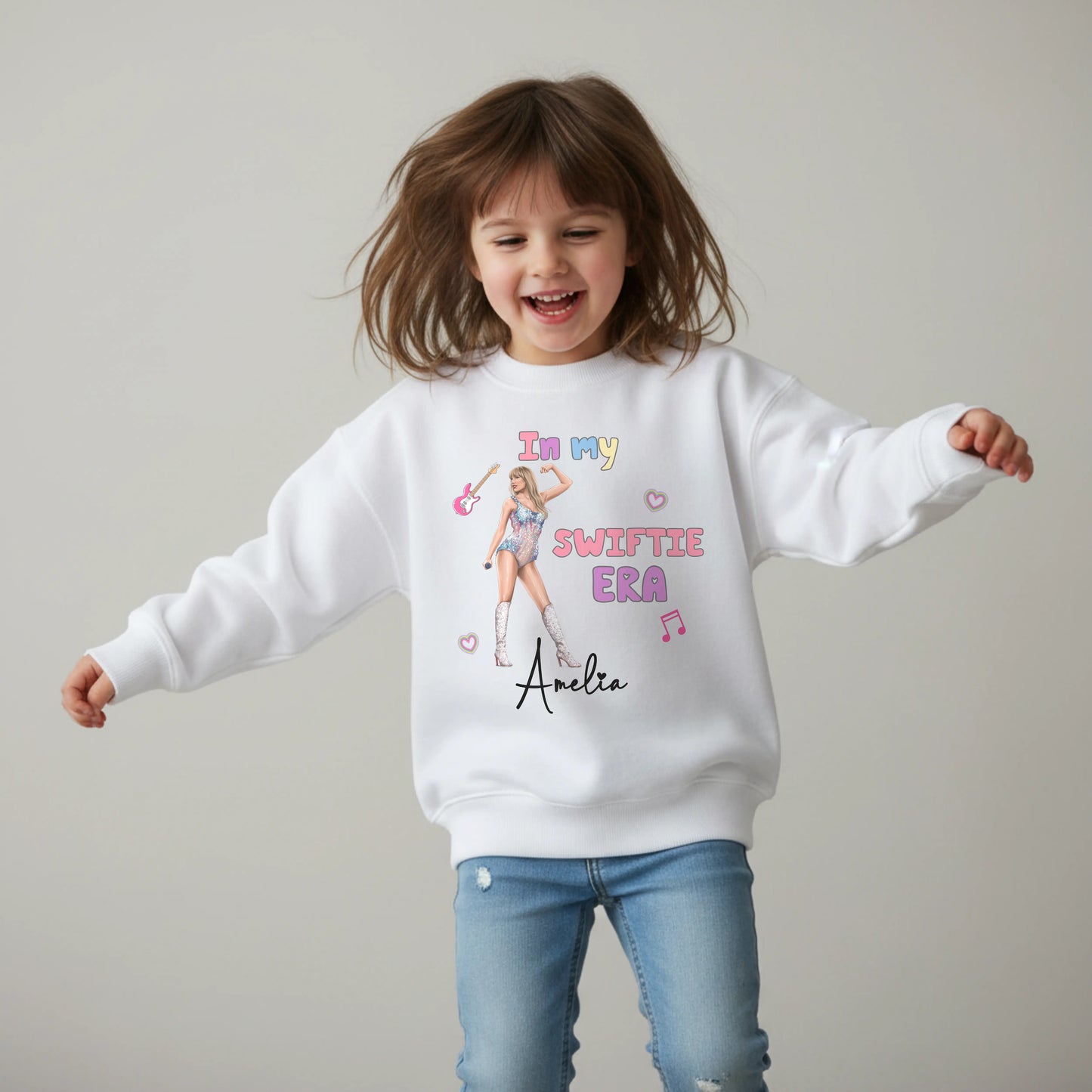 Taylor Swift sweatshirt personalised with her custom name for everyday wear. The perfect girls gift for the little Swifie