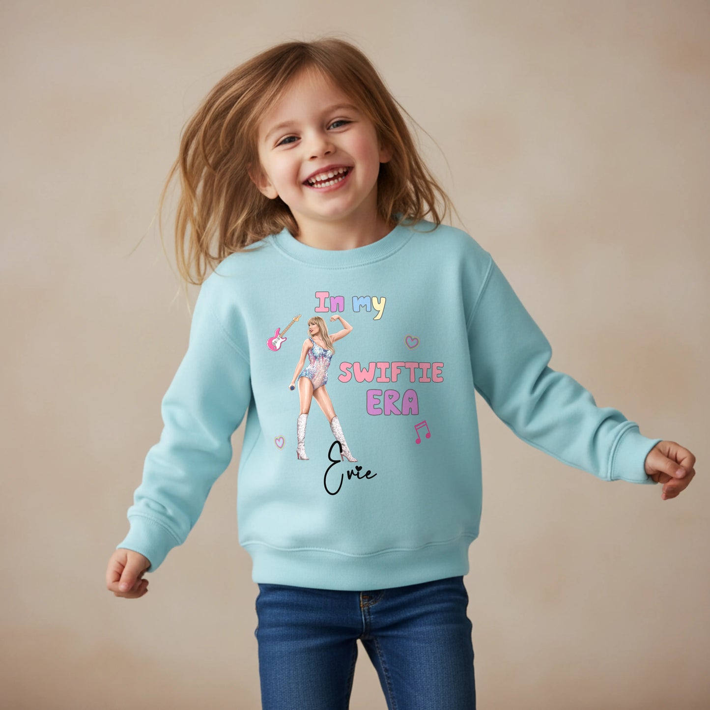 Taylor Swift sweatshirt personalised with her custom name for everyday wear. The perfect girls gift for the little Swifie