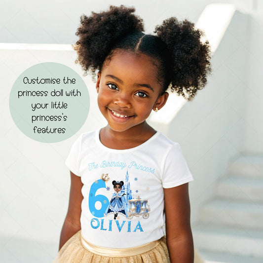 A charming, personalized girls&#39; birthday T-shirt designed for a princess-themed celebration. The design is a soft blue, reminiscent of an ice princess&#39;s gown, crafted from 100% cotton for comfort. Its front features a delightful illustration of a snow princess, surrounded by delicate snowflakes. The design is completed with customizable elements, displaying a name and age in elegant, white script. This tee is perfect for creating a magical birthday experience for any young princess.