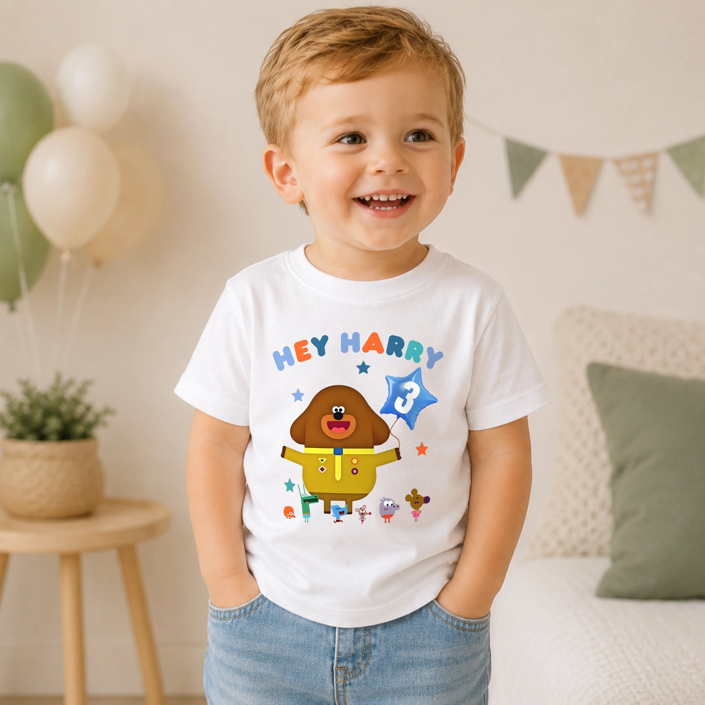 A personalised Hey Duggee kids birthday t-shirt featuring a colourful character design and the text "HEY Harry" on the front.