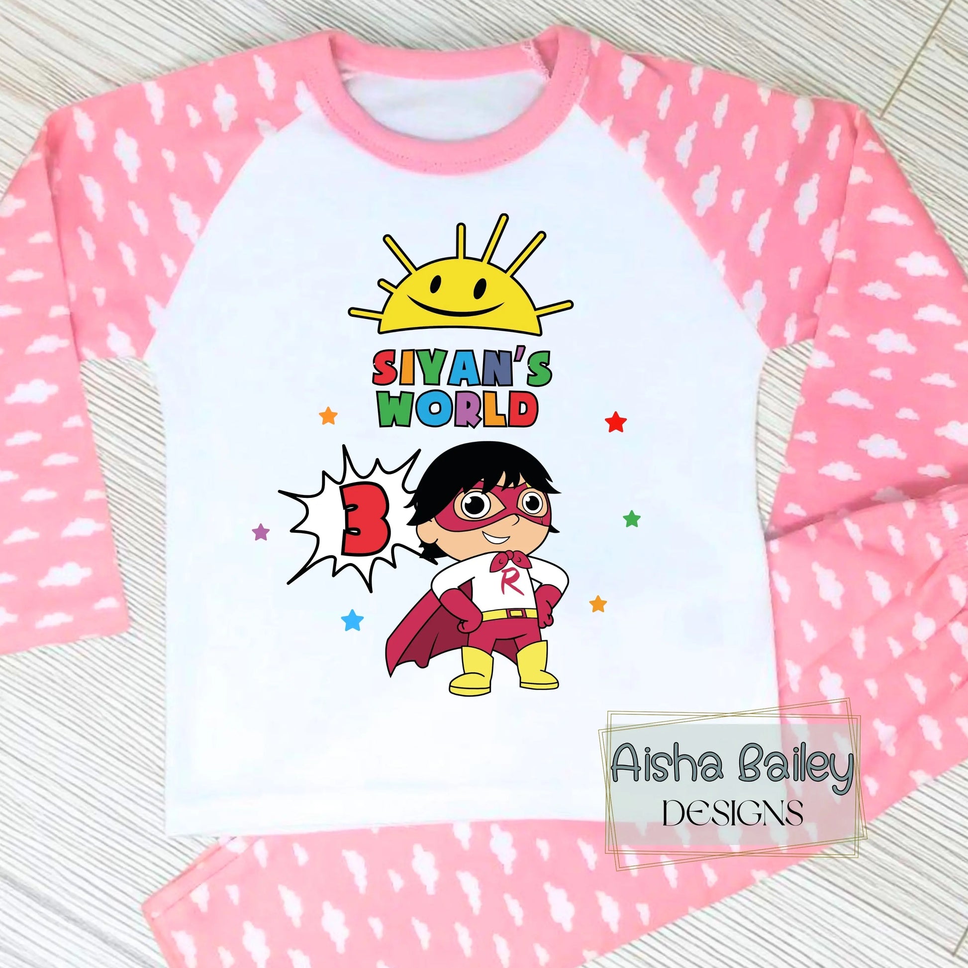 Ryan's World personalised birthday pyjamas for girls with colourful superhero design